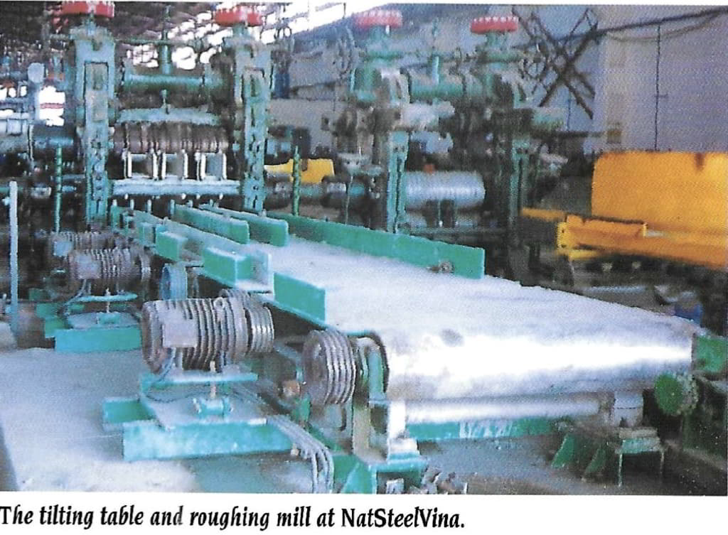 A picture containing factory, machine, building, industryDescription automatically generated